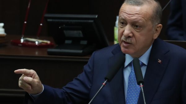 Turkish President and leader of the Justice and Development Party (AK Party) Recep Tayyip Erdogan speaks during his party's group meeting at the Turkish Grand National Assembly in Ankara on November 11, 2020. Turkish President promised on November 11, 2020 to adopt painful reforms and threw his full support behind a new economic team installed after his powerful son-in-law resigned. Adem ALTAN / AFP