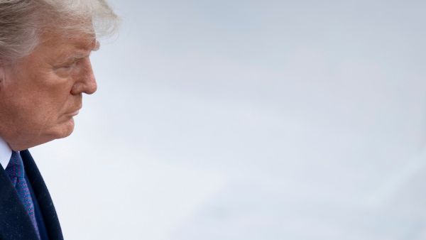 US President Donald Trump arrives for a wreath laying ceremony at the Tomb of the Unknown Soldier on Veterans Day at Arlington National Cemetery in Arlington, Virginia, on November 11, 2020. US President Donald Trump made his first official post-election appearance Wednesday for what should be a moment of national unity to mark Veteran's Day, now marred by his refusal to acknowledge Joe Biden's win. The president visited Arlington National Cemetery, four days after US media projected his Democratic rival wo