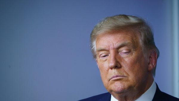 US President Donald Trump looks down during an event on lowering prescription drug prices in the Brady Briefing Room of the White House in Washington, DC on November 20, 2020. MANDEL NGAN / AFP