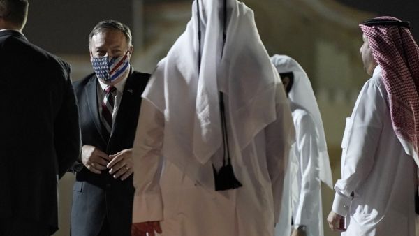 US Secretary of State Mike Pompeo prepares to board his plane at the Old Doha International airport in the Qatari capital Doha, on November 21, 2020. Pompeo met with negotiators from the Afghan government and the Taliban in Qatar, and will finish his tour with a stop in Saudi Arabia. Patrick Semansky / POOL / AFP