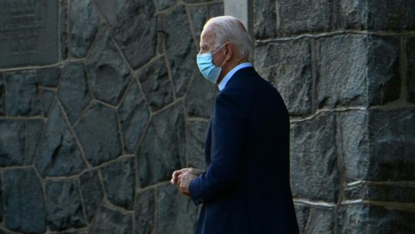 President-elect Joe Biden leaves after attending mass at Saint Ann Catholic Church on November 21, 2020 in Wilmington, Delaware. CHANDAN KHANNA / AFP