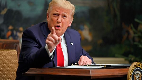 Speaking to reporters on Thanksgiving Day (above), Trump refused to say if he would attend Biden's inauguration at all. However he said he would leave the White House if the electoral college certifies Biden's victory when it meets on December 14. (AFP)