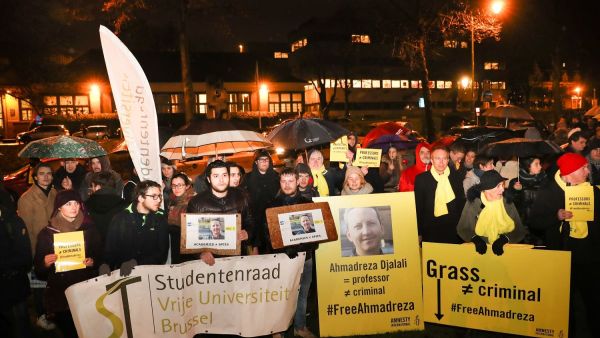 A photo taken on February 13, 2017 shows a flyer during a protest outside the Iranian embassy in Brussels for Ahmadreza Djalali, an Iranian academic detained in Tehran for nearly a year and reportedly sentenced to death for espionage. (AFP)