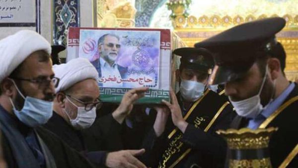 The coffin of Iran's assassinated top nuclear scientist Mohsen Fakhrizadeh carried during funeral procession at Fatima Masumeh's Shrine in Qom, south of Tehran. November 29, (AFP)