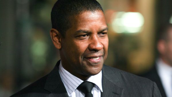 Denzel Washington attends The Book of Eli premiere on January 11 2010 at Grauman's Chinese Theater in Hollywood, California. (shutterstock)