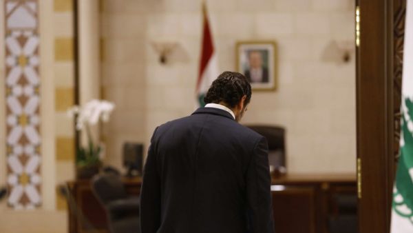 In this file photo taken on October 18, 2019, Lebanese Prime Minister Saad Hariri walks after giving an address at the government headquarters in the centre of the capital Beirut. The Arab Spring uprisings are nearly a decade-old and moribund but protests in Lebanon and three other new countries last year revealed that the spirit of the revolts that lit up 2011 is still alive. The countries swept up by the latest revolts had initially stood on the sidelines as a contagion of uprisings gripped countries in t