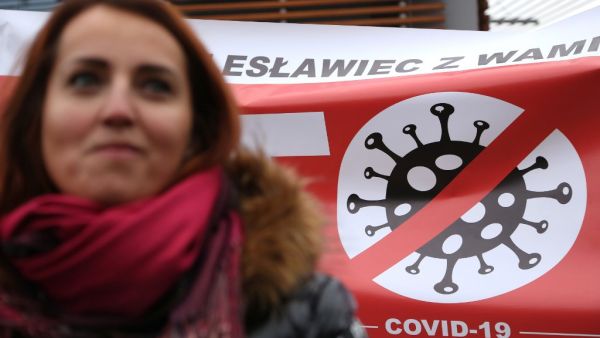 A protester takes part in a demonstration against measures to curb the spread of the novel coronavirus (COVID-19), in Slubice, Poland, on November 28, 2020. Adam Berry / AFP