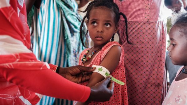A four-year-old Ethiopian girl who fled the Tigray conflict as a refugee is measured at a malnutrition center at Village Eight transit centre near the Ethiopian border in Gedaref, eastern Sudan, on December 2, 2020. Yasuyoshi CHIBA / AFP A four-year-old Ethiopian girl who fled the Tigray conflict as a refugee is measured at a malnutrition center at Village Eight transit centre near the Ethiopian border in Gedaref, eastern Sudan, on December 2, 2020. Yasuyoshi CHIBA / AFP