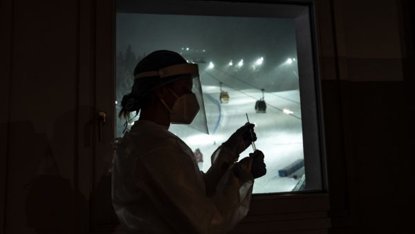 A nurse holds a swab test at the Covid Testing Position organized by the International Ski Federation (FIS) on the eve of its World Cup event on December 4, 2020 in Santa Caterina Valfurva, Northern Italy. Marco Bertorello / AFP A nurse holds a swab test at the Covid Testing Position organized by the International Ski Federation (FIS) on the eve of its World Cup event on December 4, 2020 in Santa Caterina Valfurva, Northern Italy. Marco Bertorello / AFP