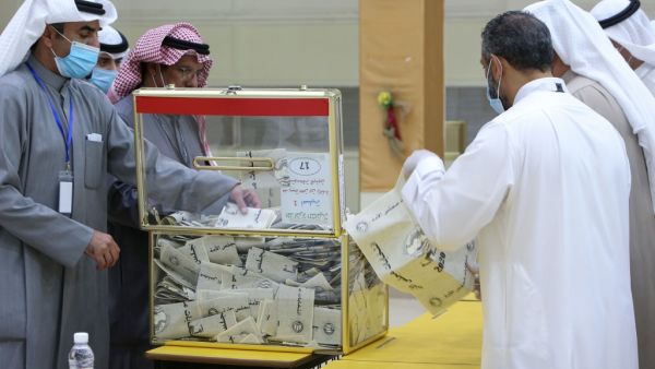 Kuwaitis hoping for reform went to the polls in a parliamentary election overshadowed by COVID-19, with facilities laid on so citizens infected with the disease could vote in special polling stations. YASSER AL-ZAYYAT / AFP