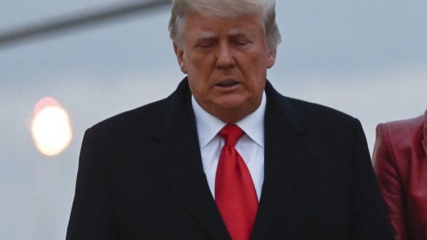 US President Donald Trump and US First Lady Melania Trump depart from Joint Base Andrews, Maryland on the way to a rally on December 5, 2020. President Donald Trump ventures out of Washington on Saturday for his first political appearance since his election defeat to Joe Biden, campaigning in Georgia where two run-off races will decide the fate of the US Senate. ANDREW CABALLERO-REYNOLDS / AFP
