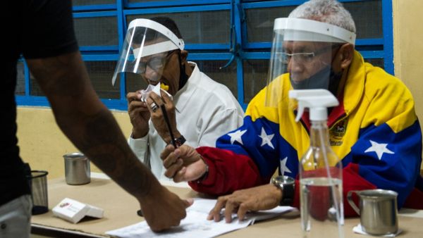 Venezuelans voted Sunday in legislative elections set to tighten President Nicolas Maduro's grip on power and further weaken his US-backed opposition rival Juan Guaido, who is leading a boycott of the polls he calls a fraud. Cristian Hernandez / AFP Venezuelans voted Sunday in legislative elections set to tighten President Nicolas Maduro's grip on power and further weaken his US-backed opposition rival Juan Guaido, who is leading a boycott of the polls he calls a fraud. Cristian Hernandez / AFP