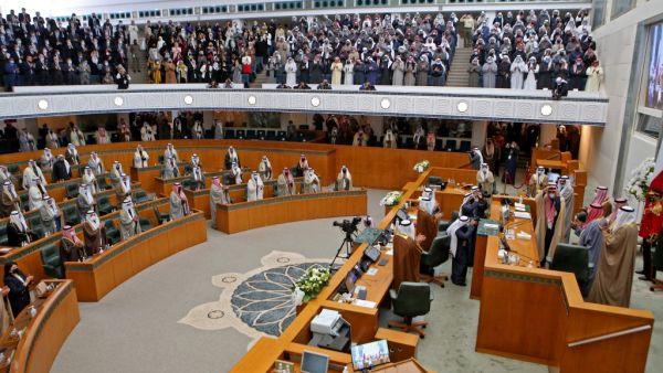 Kuwaiti MPs attend the first regular session of the 16th legislative term, at the parliament in Kuwait City on December 15, 2020. Yasser Al-Zayyat / AFP