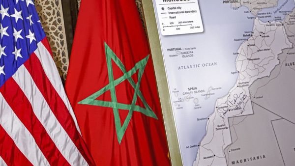 This file photo taken on December 12, 2020 shows (L to R) US and Moroccan flags next to a US State Department-authorised map of Morocco recognising the internationally-disputed territory of the Western Sahara (bearing a signature by US Ambassador to Morocco David T. Fischer) as a part of the North African kingdom, in Morocco's capital Rabat. US President Donald Trump's surprise backing of Morocco's claim to sovereignty over disputed Western Sahara upended years of international consensus, but will this break a deadlock or inflame a conflict? AFP This file photo taken on December 12, 2020 shows (L to R) US and Moroccan flags next to a US State Department-authorised map of Morocco recognising the internationally-disputed territory of the Western Sahara (bearing a signature by US Ambassador to Morocco David T. Fischer) as a part of the North African kingdom, in Morocco's capital Rabat. US President Donald Trump's surprise backing of Morocco's claim to sovereignty over disputed Western Sahara upended years of international consensus, but will this brea