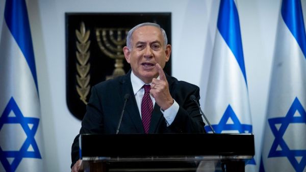 Israeli Prime Minister Benjamin Netanyahu delivers a speech at the Knesset (Israeli Parliament) in Jerusalem on December 22, 2020. Yonathan SINDEL / POOL / AFP