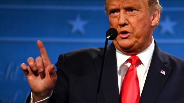 In this file photo taken on October 22, 2020 US President Donald Trump gestures as he speaks during the final presidential debate at Belmont University in Nashville, Tennessee. President Donald Trump on December 22, 2020 rejected a $900 billion bipartisan Covid stimulus package, calling it "a disgrace" and demanding that lawmakers more than triple relief payments to Americans. JIM WATSON / AFP