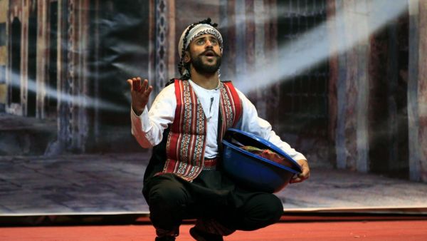 A Yemeni actor rehearses on the eve of the premiere of a play entitled 'Yemeni Film', a comedic production that touches on the current struggles of local artists, in the capital Sanaa, on December 23, 2020. The three showings of the play were a welcomed distraction and rare in the country that the United Nations says is the world's worst humanitarian crisis, which has only gotten worse with the spread of the novel coronavirus. Tens of thousands of people have been killed in Yemen since 2015, when a Saudi-le