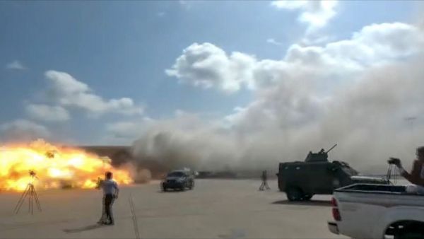 A video grab shows the moment an ordnance hit the airport in the southern Yemeni port city of Aden on December 30, 2020, shortly after the arrival of a plane carrying members of a new unity government. Explosions rocked Yemen's Aden airport on Wednesday shortly after the arrival of a plane carrying members of a new unity government, an AFP correspondent at the scene said. "At least two explosions were heard as the cabinet members were leaving the aircraft," the correspondent said. Yemen's internationally recognised government and southern separatists formed a new power-sharing cabinet on December 18, and arrived in the southern city of Aden on Wednesday, days after being sworn in Saudi Arabia. AFPTV / AFP A video grab shows the moment an ordnance hit the airport in the southern Yemeni port city of Aden on December 30, 2020, shortly after the arrival of a plane carrying members of a new unity government. Explosions rocked Yemen's Aden airport on Wednesday shortly after the arrival of a plane carrying members of a new unity government, an AFP correspondent at the scene said. "At least two explosions were heard as the cabinet members were leaving the aircraft," the correspondent said. Yemen's internationally re