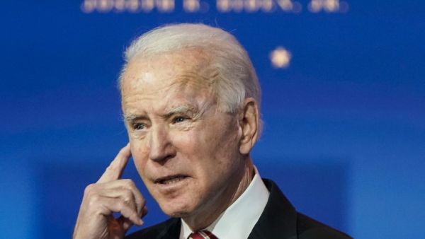 President-Elect Joe Biden announces Miguel Cardona as his nominee for Education Secretary at the Queen theatre on December 23, 2020 in Wilmington, Delaware. Cardona, the Connecticut Education Commissioner, will face the urgent task of planning to reopen schools safely during the COVID-19 pandemic. Joshua Roberts/Getty Images/AFP JOSHUA ROBERTS / GETTY IMAGES NORTH AMERICA / Getty Images via AFP