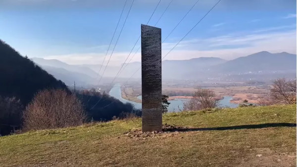 A metal monolith identical to the one recently found in #Utah has just appeared on a hillside in Romania. (Twitter)