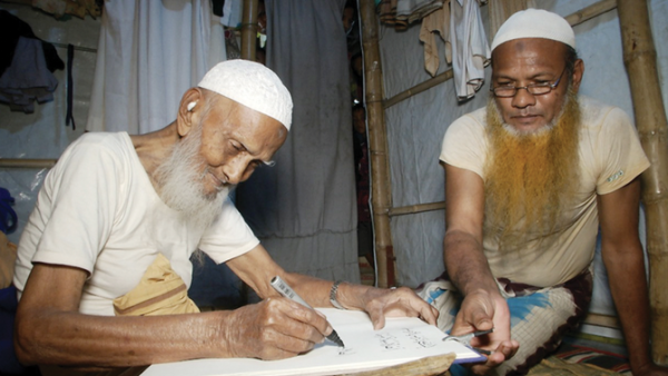 Mohammad Ershad, a 108-year-old Rohingya refugee, is renowned for his calligraphy at the Cox’s Bazar camps in Bangladesh. (Twitter)