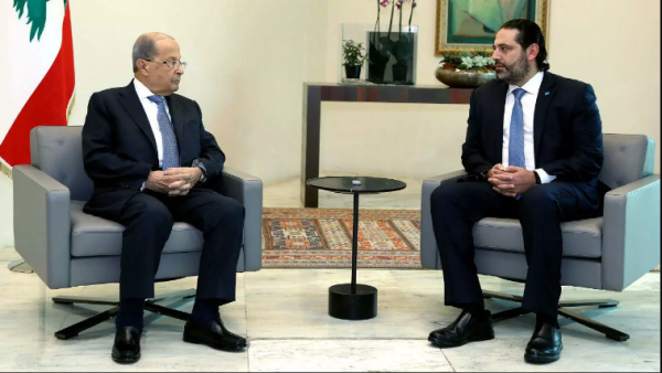 Lebanese President Michel Aoun (L) meeting with Prime Minister Saad Hariri at the presidential palace in Baabda, east of the capital Beirut, on October 21, 2019. Dalati and Nohra, AFP.