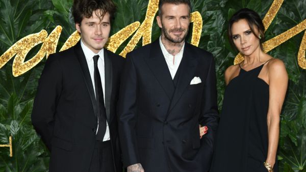 Brooklyn Beckham, David Beckham & Victoria Beckham at The Fashion Awards 2018. (shutterstock)