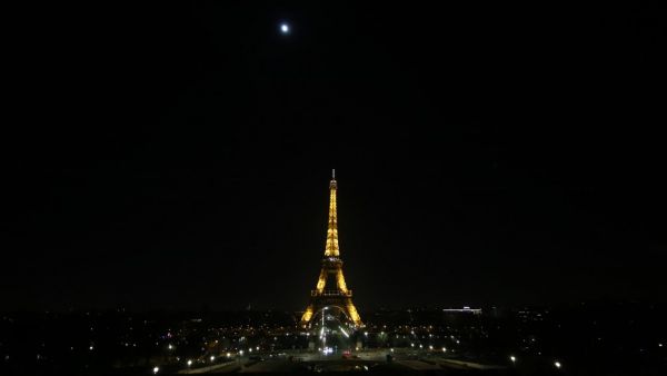 This picture shows the illuminated eiffel tower during the New Year's Eve as a 8:00 pm-6:00 am curfew is implemented in France to avoid a third wave of Covid-19 infections, in Paris, on January 1, 2021. There is still a nationwide overnight curfew from 8:00 pm to halt the spread of the virus while restaurants and cafes as well as theatres and cinemas remain closed. Stefano RELLANDINI / AFP