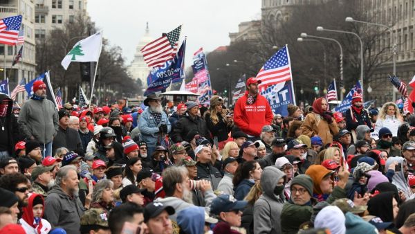 Supporters of US President Donald Trump hold a rally as they protest the upcoming electoral college certification of Joe Biden as President in Washington, DC on January 5, 2021. SAUL LOEB / AFP