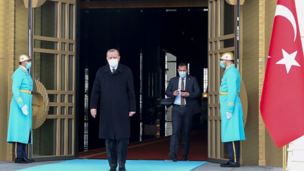 Turkey's President Recep Tayyip Erdogan (C-L) arrives to welcome the Albanian Prime Minister during an official welcoming ceremony at the Presidential Complex in Ankara on January 6, 2021. Adem ALTAN / AFP