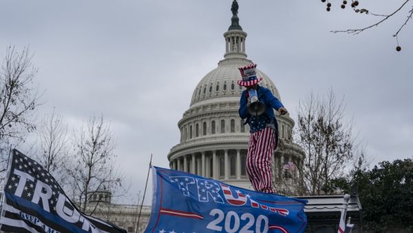 Supporters of US President Donald Trump protest outside the US Capitol on January 6, 2021, in Washington, DC. Demonstrators breeched security and entered the Capitol as Congress debated the a 2020 presidential election Electoral Vote Certification. ALEX EDELMAN / AFP