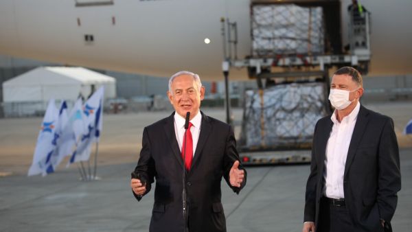 Netanyahu announced earlier this week that he had signed a deal for enough doses of the Pfizer-BioNTech vaccine for all Israelis over 16 to be innoculated. Israel, with a population of nine million, has recorded over 3,600 deaths from the Covid-19 illness.  Motti MILLROD / POOL / AFP