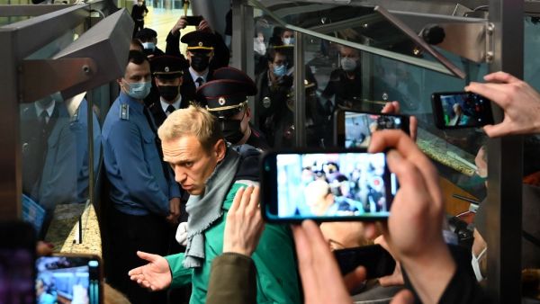 Russian opposition leader Alexei Navalny is seen at the passport control point at Moscow's Sheremetyevo airport on January 17, 2021. Russian police detained Kremlin critic Alexei Navalny at a Moscow airport shortly after he landed on a flight from Berlin, an AFP journalist at the scene said. Kirill KUDRYAVTSEV / AFP