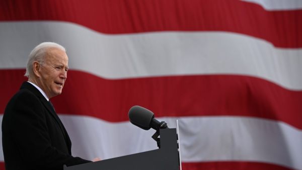 In this file photo US President-Elect Joe Biden speaks at Major Joseph R. "Beau" Biden III National Guard /Reserve Center in New Castle Airport on January 19, 2021, in New Castle, Delaware, before departing for Washington, DC. US President-elect Joe Biden plans to kick off his new administration January 20, 2021 with orders to restore the United States to the Paris climate accord and the World Health Organization, aides said. JIM WATSON / AFP