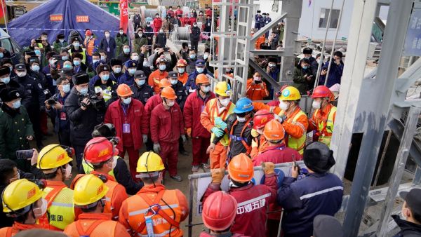 One of twenty-two Chinese miners is saved from hundreds of metres underground where they had been trapped for two weeks after a gold mine explosion in Qixia, in eastern China's Shandong province on January 24, 2021. STR / CNS / AFP