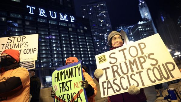  A small group of demonstrators protest near Trump Tower on January 07, 2021 in Chicago, Illinois. They called for the removal of President Donald Trump from office after a pro-Trump mob stormed the Capitol building in Washington, DC yesterday as lawmakers met to count the Electoral College votes in the presidential election. Scott Olson/Getty Images/AFP