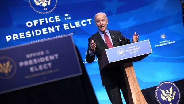 Biden announced he is nominating Rhode Island Gov. Gina Raimondo as his commerce secretary, Boston Mayor Martin J. Walsh his labor secretary and Isabel Guzman, a former Obama administration official, as head of the Small Business Administration. Chip Somodevilla/Getty Images/AFP