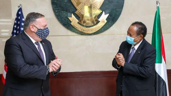 US Secretary of State Mike Pompeo (L) meets with Sudanese Prime Minister Abdalla Hamdok (R) in Khartoum, last August. (AFP)