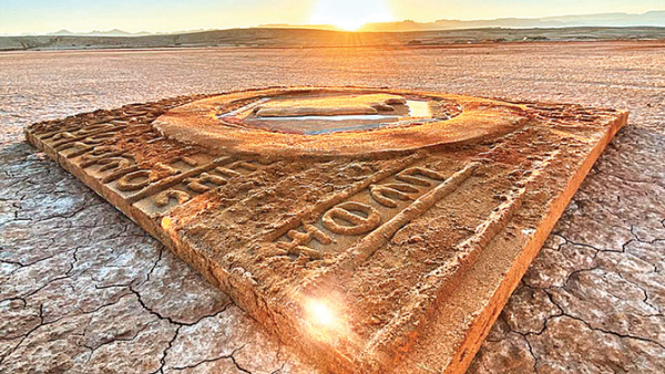 The GCC logo appears at the center of the piece surrounded by inscriptions resembling the rock art and carvings of the Lihyan civilization. (Instagram)