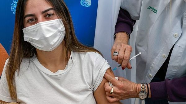 Or, an 18-year-old teenager, receives a dose of the Pfizer-BioNtech COVID-19 coronavirus vaccine at Clalit Health Services, in Israel's Mediterranean coastal city of Tel Aviv, January 23. AFP