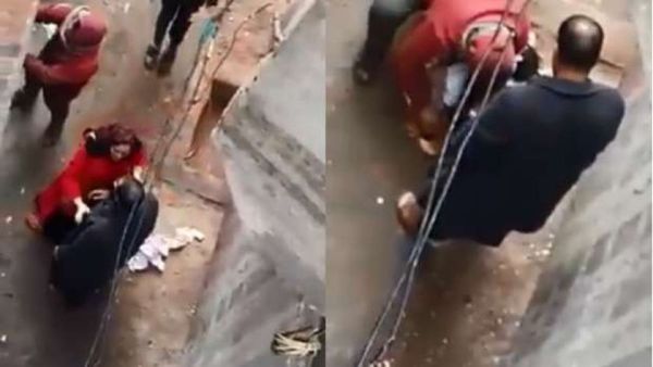 مصري يجرد رضيعته من ملابسها في الشارع ويحاول حرقها 