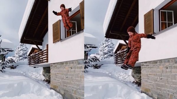The brave youngster performs a stylish jump into the snow, which his father films in slow motion. (Instagram)