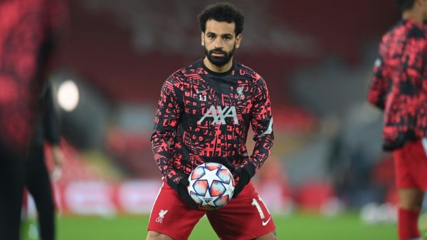 The former Reds striker believes the Egyptian frontman is trying to do too much by himself, with Jurgen Klopp’s side struggling for an attacking spark (Photo: AFP)