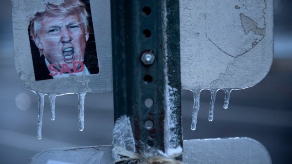 A sticker with former US President Donald Trump image on it is seen on Capitol Hill February 1, 2021, in Washington, DC. Brendan Smialowski / AFP