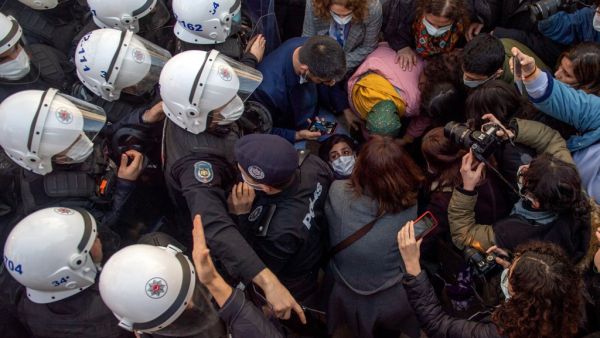 Turkish police officers detain protestors during a rally in support of Bogazici University students protesting against the appointment of Melih Bulu, a ruling Justice and Development Party (AKP) loyalist, as the new rector of the university, in Istanbul on February 4, 2021. Students are protesting against the Turkish president's decision last month (January 1) to name party loyalist Melih Bulu to head Istanbul's elite Bogazici University, with many students seeing his appointment as a part of the president'