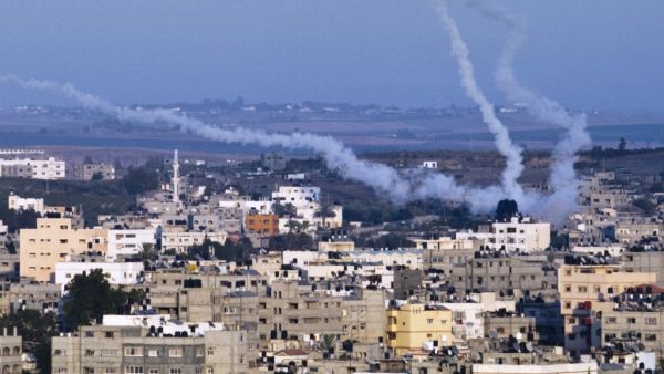  In this file photo taken on August 21, 2014 smoke trails mark the path of Palestinian missiles fired from the north-east of Gaza City. The International Criminal Court's ruling that it has jurisdiction over events in the Palestinian territories opens the way to an investigation of alleged war crimes committed in the 2014 Israeli-Palestinian conflict in Gaza. The 50-day war, which devastated the coastal enclave and left 2,251 dead on the Palestinian side, mostly civilians, and 74 on the Israeli side, mostly