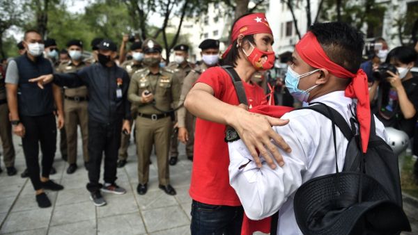 This photo taken on February 7, 2021, shows Myanmar migrants protesting against the military coup in their home country, in Bangkok. Organising protests, gathering supporters and distributing posters of their beloved leader Aung San Suu Kyi, Myanmar workers in Thailand are adding to a chorus of dissent against a coup that has upended their home country.  Lillian SUWANRUMPHA / AFP This photo taken on February 7, 2021, shows Myanmar migrants protesting against the military coup in their home country, in Bangkok. Organising protests, gathering supporters and distributing posters of their beloved leader Aung San Suu Kyi, Myanmar workers in Thailand are adding to a chorus of dissent against a coup that has upended their home country.  Lillian SUWANRUMPHA / AFP