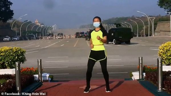 Khing Hnin Wai, a PE teacher from Myanmar's capital Naypyidaw, was recording a workout video in front of the country's parliament on Monday when a coup took place behind her. (Facebook)