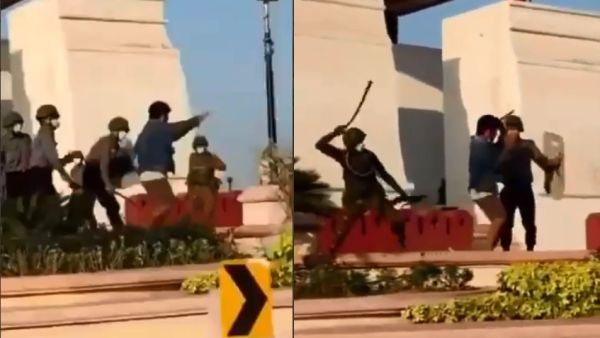 Myanmar military men beating up a civilian for participating in the national-wide protests. (Twitter/ Video Screenshot)