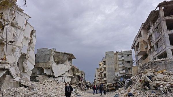 This file photo taken on March 14, 2019 shows destruction following an airstrike in the jihadist-held city of Idlib, northwestern Syria. (Muhammad Haj Kadour/AFP) Death and destruction in Syria